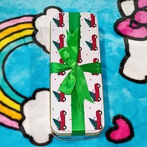 Holiday Tin Box with Red Truck Pattern & Green Ribbon
